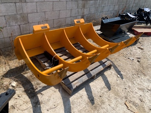 UNUSED FIVE TINE RAKE ATTACHMENT, fits skidsteer. --(LOCATED IN COLTON, CA)--