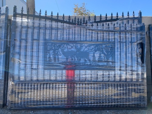 UNUSED 18'X7' BI-PARTING WROUGHT IRON GATE --(LOCATED IN COLTON, CA)--