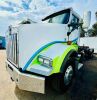 2008 KENWORTH T800B ROLL-OFF TRUCK, Cummins 11L diesel, engine brake, Eaton-Fuller 10-speed, pto, 18,000# front, Spartan roll-off system, air ride suspension, air trailer hookups, tow package, 40,000# rears. s/n:1NKDL00X08R203725