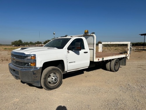 2017 CHEVROLET SILVERADO 3500 FLATBED TRUCK, 6.6L diesel, Allison automatic, a/c, pw, pdl, pm, 14' flatbed, stake sides, 1,300# Tommy Gate lift gate, tow package. s/n:1GB3CYEY7HF197764 --(LOCATED IN MADERA, CA)--