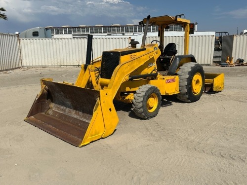 2006 JOHN DEERE 210LE SKIPLOADER, 4-in-1 bucket, 4x4, canopy, dual tilt, rear scraper. s/n:T0210LE885582