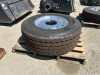 RIM W/TIRE, fits truck tractor --(LOCATED IN COLTON, CA)--