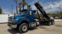 2020 INTERNATIONAL HV613 ROLL-OFF TRUCK, 430hp diesel, automatic, pto, 18,740# front, Amrep 22' rails, Pioneer RP4500 tarp system, winch, 40,000# rears, tow package, 71,595 miles indicated. s/n:3HAESTZT8LL825267