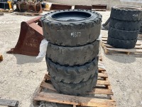 APPROX. (4) RIMS W/TIRES, fits Bobcat skidsteer. --(LOCATED IN COLTON, CA)--