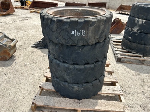 APPROX. (4) RIMS W/TIRES, fits Bobcat skidsteer. --(LOCATED IN COLTON, CA)--