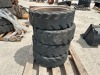 APPROX. (4) RIMS W/TIRES, fits Bobcat skidsteer. --(LOCATED IN COLTON, CA)-- - 2