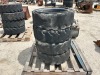 APPROX. (4) RIMS W/TIRES, fits Bobcat skidsteer. --(LOCATED IN COLTON, CA)-- - 2