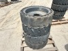 APPROX. (4) RIMS W/TIRES, fits Bobcat skidsteer. --(LOCATED IN COLTON, CA)-- - 4