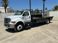 2013 FORD F750 FLATBED TRUCK, Cummins 200hp diesel, 6-speed, 12,000# front, 23' flatbed, Maxxon lift gate, 21,000# rear, 64,459 miles indicated. s/n:3FRNF7FA4DV026422