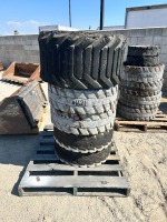 APPROX. (4) RIMS W/TIRES, fits skidsteer, TIRE --(LOCATED IN COLTON, CA)--