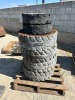 APPROX. (6) RIMS W/TIRES, fits skidsteer --(LOCATED IN COLTON, CA)--