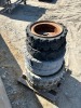 APPROX. (6) RIMS W/TIRES, fits skidsteer --(LOCATED IN COLTON, CA)-- - 4