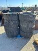 APPROX. (12) RIMS W/TIRES, fits skidsteer --(LOCATED IN COLTON, CA)--
