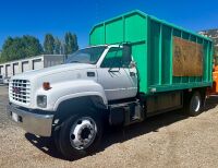 2001 GMC C6500 CHIPPER TRUCK, 8.1L gasoline, 6-speed, a/c, pto, 17,850# rear, tow package, 27,841 miles indicated. s/n:1GDJ7H1E31J511749
