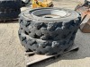 APPROX. (2) RIMS W/TIRES, fits reach lift. --(LOCATED IN COLTON, CA)--